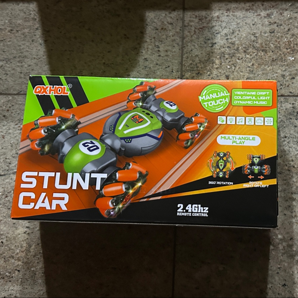Dynamic Stunt Car with Orange and Green Accents